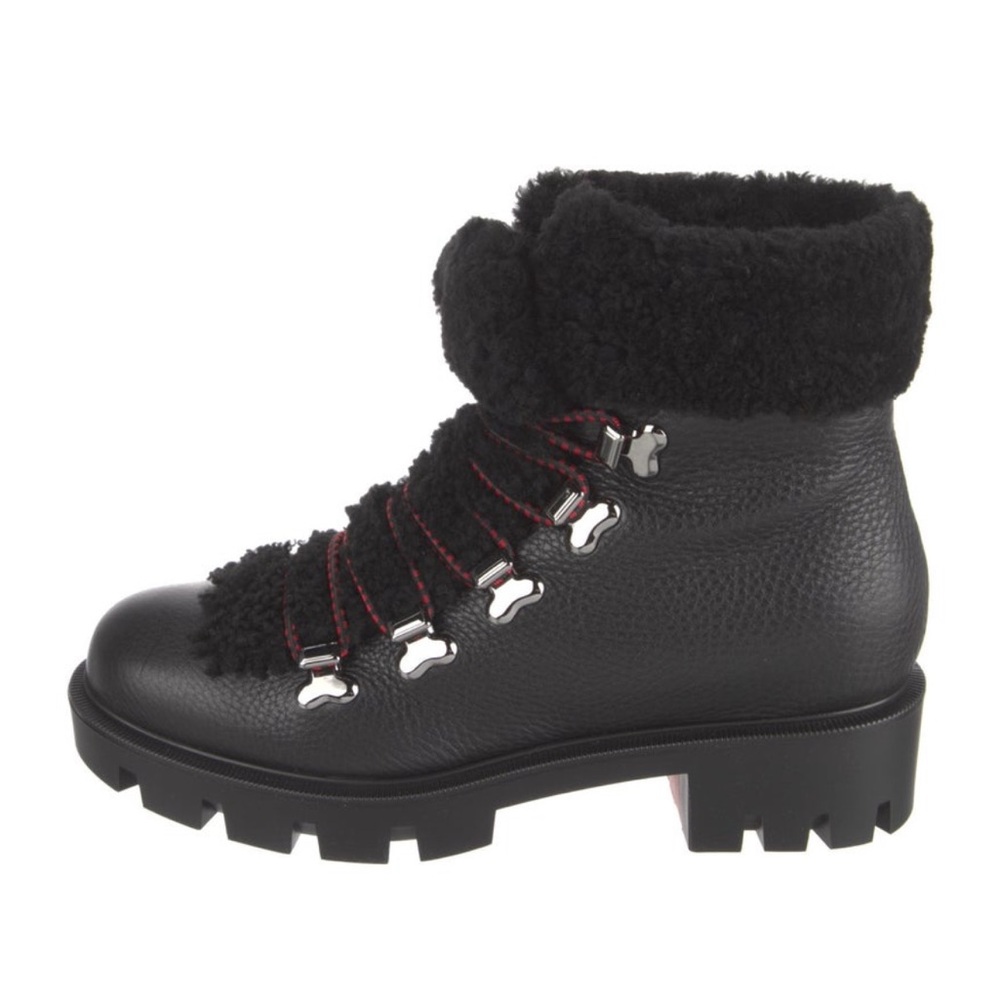Christian Louboutin Leather and shearling Boots